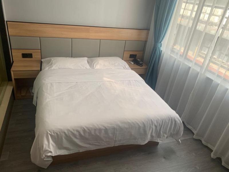 Greentree Inn Shanghai Songjiang University City New Songjiang Road Express Hotel Екстер'єр фото