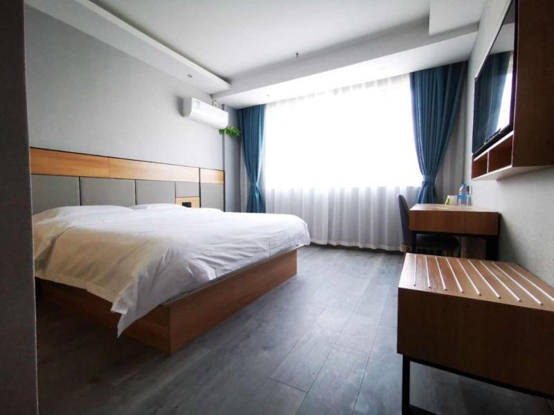 Greentree Inn Shanghai Songjiang University City New Songjiang Road Express Hotel Екстер'єр фото